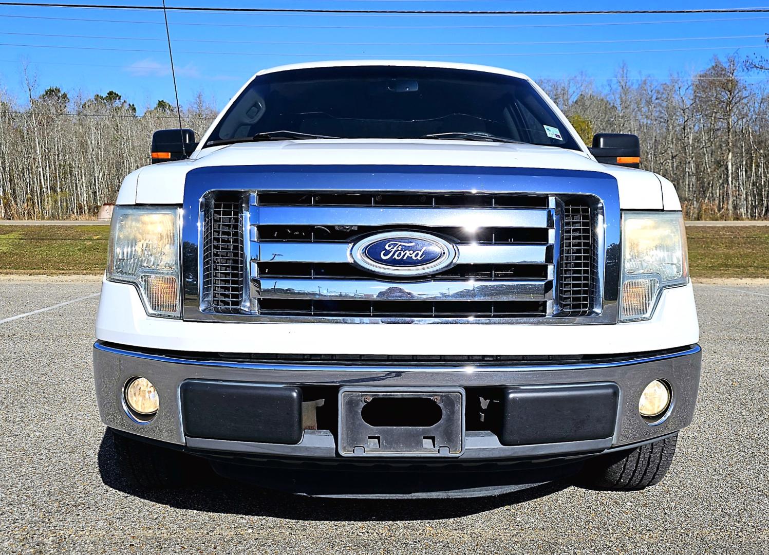 2011 White Ford F-150 LXT SuperCrew 5.5-ft. Bed 2WD (1FTEW1CM3BF) with an 3.7L V6 DOHC 24V engine, 4-Speed Automatic transmission, located at 18001 Kellogg Rd, Saucier, MS, 39574, (228) 832-1441, 39.421459, -76.641457 - Photo#23